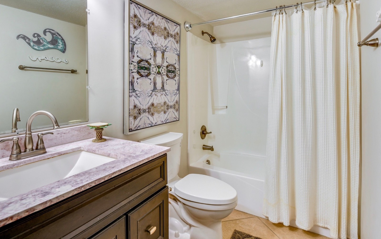 Second bathroom with tub and shower