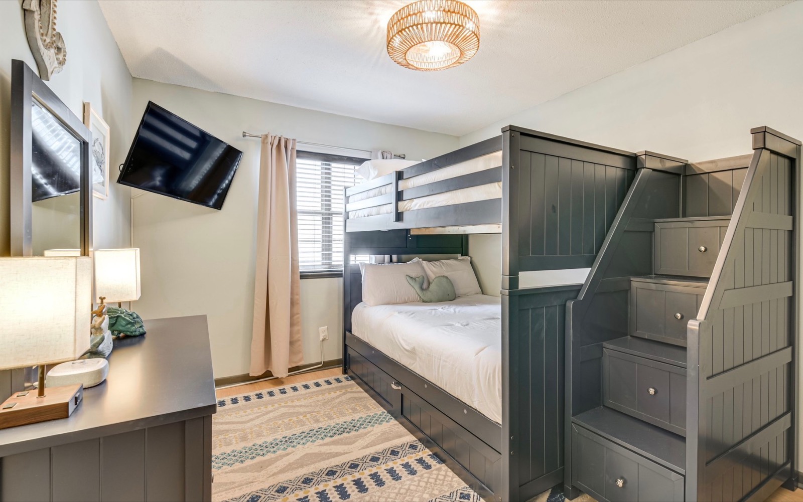 Bunk room with staircase bunk bed